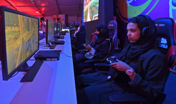 Saudi youths play at an electronic entertainment house in the Saudi Red Sea resort of Jeddah on May 15, 2019. (AFP)