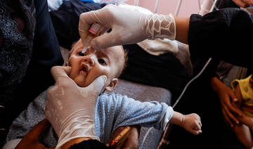 A Palestinian child is vaccinated against polio at Nasser hospital in Khan Younis in Gaza, August 31, 2024. (REUTERS)